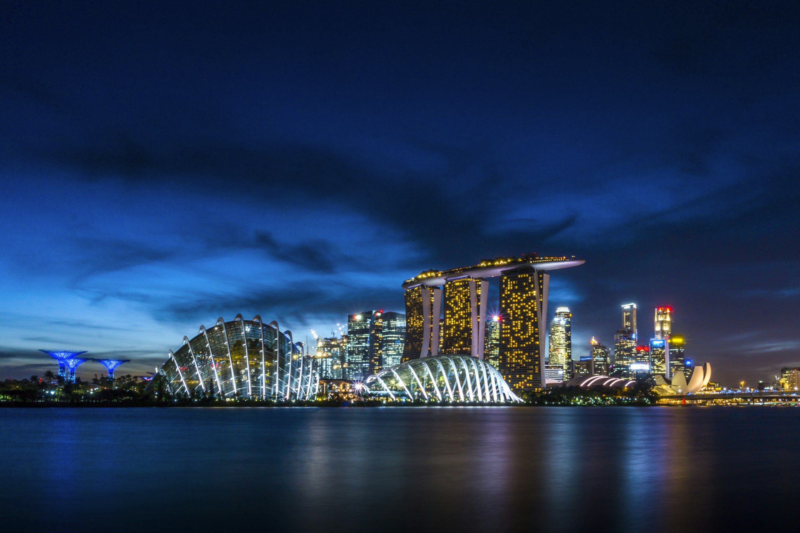 Singapore’s Marina Bay illuminated at blue hour